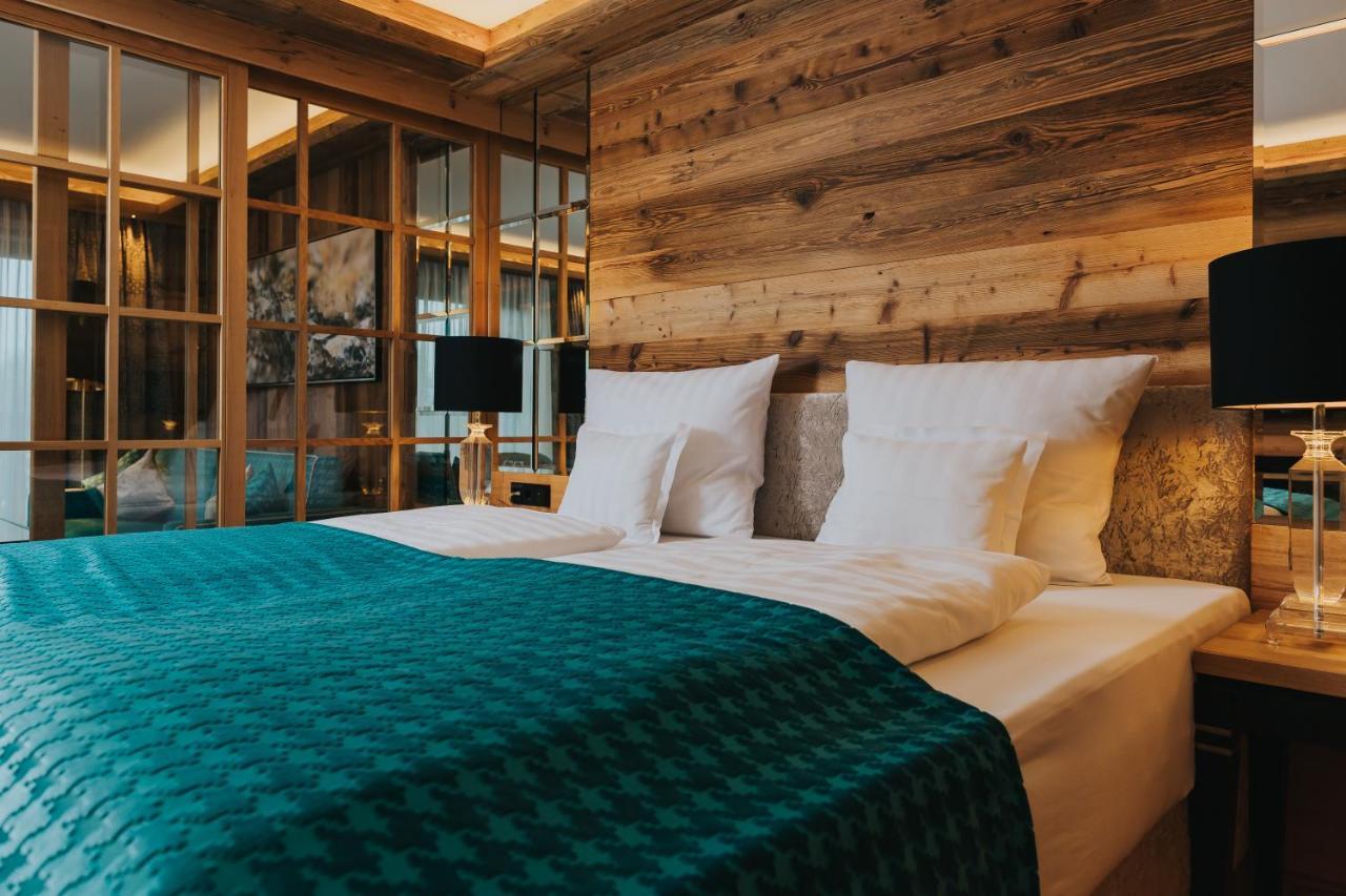 Ortner'S Resort Bad Füssing Extérieur photo A bedroom at the Hotel de la Poste